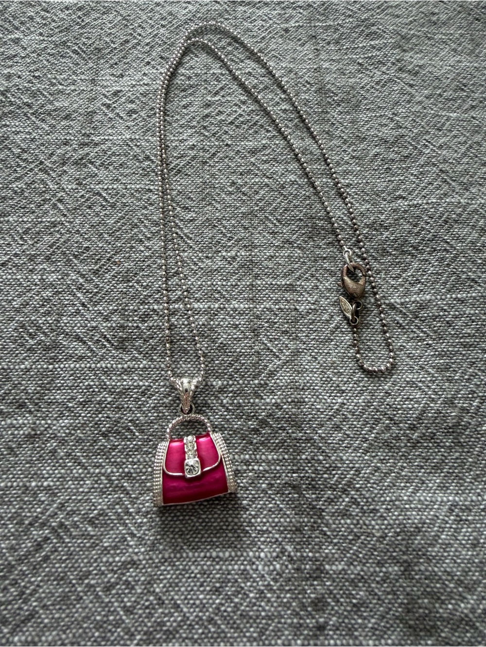 Avon Silver Tone Necklace with Pink Purse Pendant